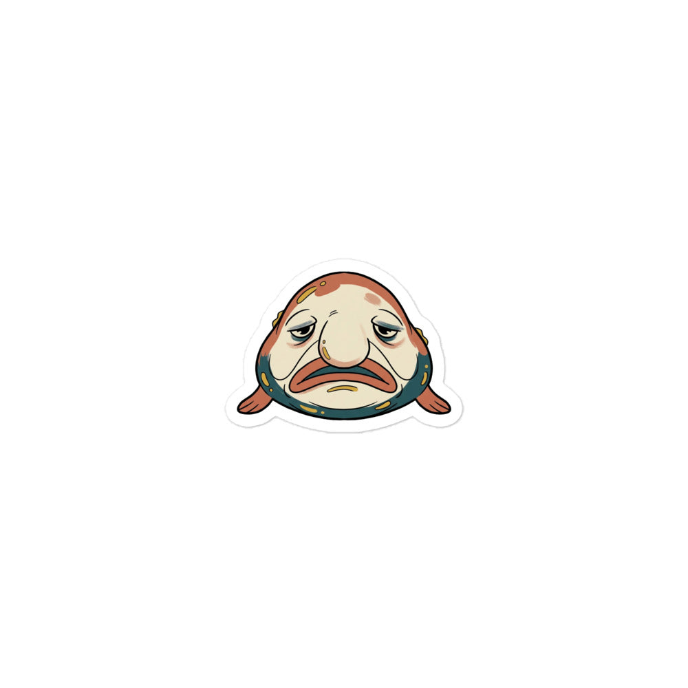 Sticker blobfish découpé kiss-cut en vinyle mat, illustration line-art face nonchalante en terracotta, bleu pétrole et crème, 7,5 × 7,5 cm