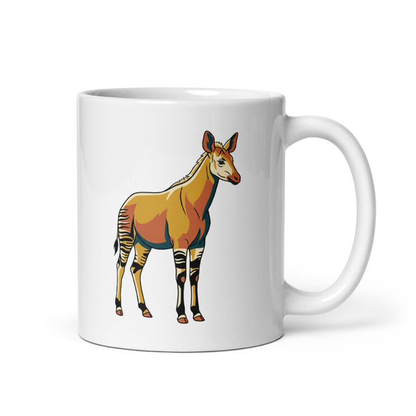 Tasse okapi céramique vue de face, illustration line art encre noire avec tons moutarde et terracotta, silhouette élégante de l'okapi aux rayures zébrées sur les pattes