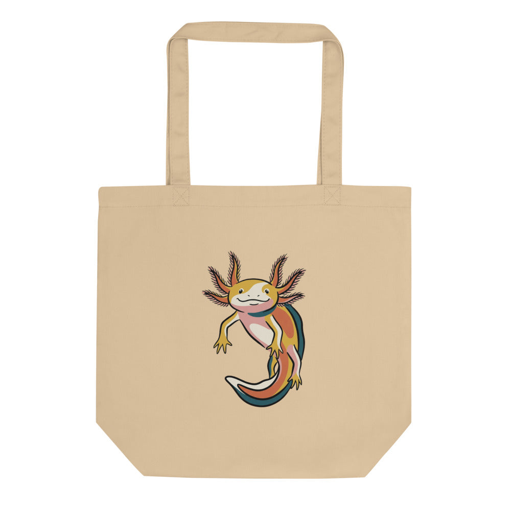 Tote bag axolotl sur fond blanc – illustration line-art encre noire, aplats rose pâle, moutarde, terracotta et bleu pétrole, 38×42 cm toile de coton