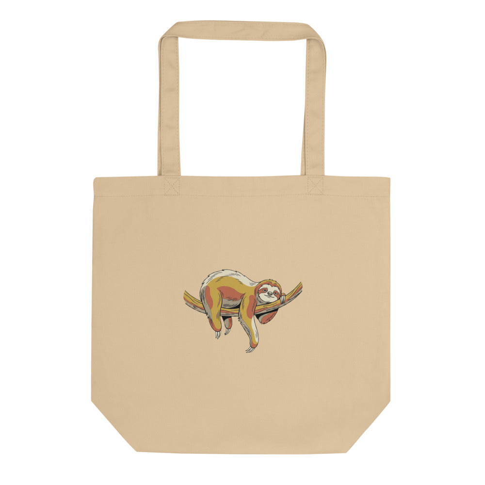 Tote bag paresseux en toile de coton, illustration line-art aux tons moutarde, terracotta et vert forêt sur fond blanc — vue de face